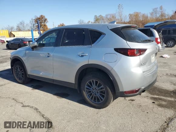 ✅ 2021 Mazda CX-5 Touring • VIN: JM3KFBCM0M0450973 • Lot: 92608715. Wystawiony na Copart z przebiegiem 91 044 mil. Bezpłatny archiwum sprzedaży aukcyjnych z USA i szczegółowy raport historii pojazdu na DreamBid. Zdjęcie 2.