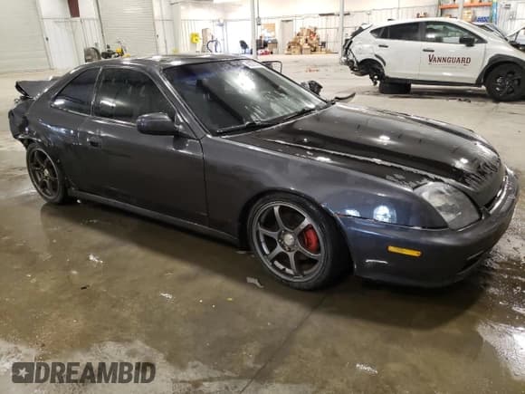 ✅ 1998 Honda Prelude • VIN: JHMBB6243WC015779 • Lot: 42591465. Listed on Copart with 145,532 mi. Free auction sales archive from the USA and detailed vehicle history report at DreamBid. Image 4.