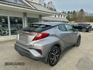 ✅ 2018 Toyota C-HR XLE • VIN: NMTKHMBX2JR029953 • Лот: 94975265. Опубликован ранее на Copart с пробегом 180 580 миль. Бесплатный доступ к архиву аукционных продаж из США и подробный отчёт об истории автомобиля на DreamBid. Изображение 4.