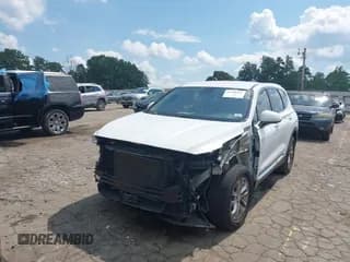 ✅ 2019 Hyundai Santa Fe SE • VIN: 5NMS2CAD6KH128817 • Лот: 43140291. Опубликован ранее на IAAI с пробегом 111 336 миль. Бесплатный доступ к архиву аукционных продаж из США и подробный отчёт об истории автомобиля на DreamBid. Изображение 2.