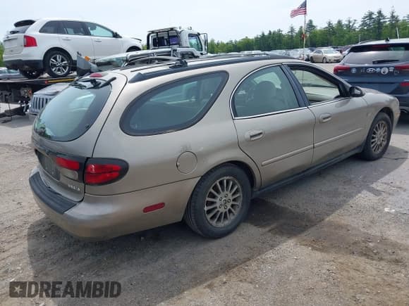 ✅ 2004 Mercury Sable LS Premium • VIN: 1MEHM59S34A626679 • Lot: 42364055. Listed on IAAI with 98,760 mi. Free auction sales archive from the USA and detailed vehicle history report at DreamBid. Image 4.