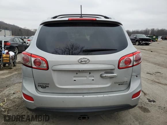 ✅ 2010 Hyundai Santa Fe Limited • VIN: 5NMSKDAG3AH383424 • Lot: 79738844. Listed on Copart with 174,729 mi. Free auction sales archive from the USA and detailed vehicle history report at DreamBid. Image 6.