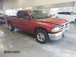 1999 Dodge Dakota SLT with VIN 1B7GL22X9XS165748, listed as a IAAI auction lot 42242480 with 103,319 mi miles and . Bid and sale history available at DreamBid. Image 1.