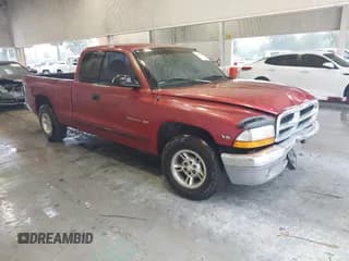 ✅ 1999 Dodge Dakota SLT • VIN: 1B7GL22X9XS165748 • Lot: 42242480. Wystawiony na IAAI z przebiegiem 103 319 mil. Bezpłatny archiwum sprzedaży aukcyjnych z USA i szczegółowy raport historii pojazdu na DreamBid. Zdjęcie 1.