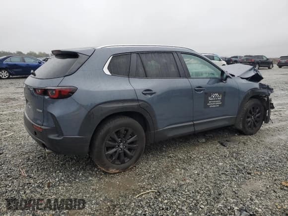 ✅ 2023 Mazda CX-50 S Preferred Plus • VIN: 7MMVABCM9PN112757 • Lot: 90320495. Listed on Copart with 57,072 mi. Free auction sales archive from the USA and detailed vehicle history report at DreamBid. Image 3.