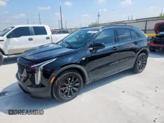 ✅ 2020 Cadillac XT4 AWD Sport • VIN: 1GYFZFR46LF109082 • Лот: 67653635. Опубликован ранее на Copart с пробегом 54 833 миль. Бесплатный доступ к архиву аукционных продаж из США и подробный отчёт об истории автомобиля на DreamBid. Изображение 1.