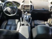 ✅ 2012 Porsche Cayenne S Hybrid • VIN: WP1AE2A29CLA90588 • Lot: 84244395. Listed on Copart with 103,610 mi. Free auction sales archive from the USA and detailed vehicle history report at DreamBid. Image 8.