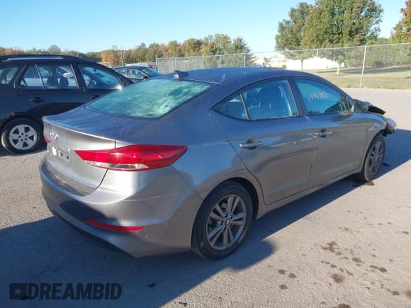 ✅ 2018 Hyundai Elantra SEL • VIN: 5NPD84LFXJH268737 • Lot: 43345986. Listed on IAAI with 96,159 mi. Free auction sales archive from the USA and detailed vehicle history report at DreamBid. Image 4.