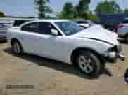 2014 Dodge Charger SE with VIN 2C3CDXBG6EH262763, listed as a Copart auction lot 59197785 with 79,062 mi miles and Salvage title. Bid and sale history available at DreamBid. Image 4.