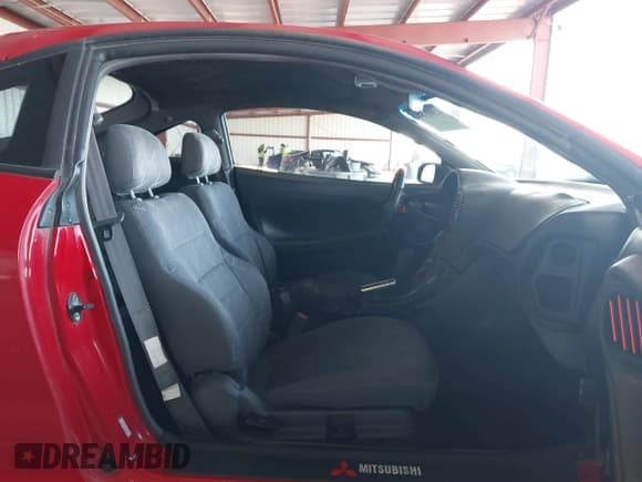 ✅ 1999 Mitsubishi Eclipse RS • VIN: 4A3AK34Y5XE085606 • Lot: 41583304. Wystawiony na IAAI z przebiegiem 277 195 mil. Bezpłatny archiwum sprzedaży aukcyjnych z USA i szczegółowy raport historii pojazdu na DreamBid. Zdjęcie 5.