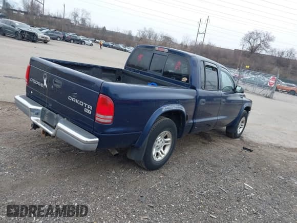 ✅ 2003 Dodge Dakota SLT • VIN: 1D7HL48X23S261258 • Lot: 41362485. Wystawiony na IAAI z przebiegiem 143 397 mil. Bezpłatny archiwum sprzedaży aukcyjnych z USA i szczegółowy raport historii pojazdu na DreamBid. Zdjęcie 4.