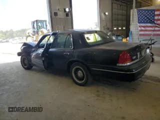 ✅ 1999 Ford Crown Victoria Police • VIN: 2FAFP71WXXX192272 • Лот: 73577384. Опубликован ранее на Copart с пробегом 278 535 миль. Бесплатный доступ к архиву аукционных продаж из США и подробный отчёт об истории автомобиля на DreamBid. Изображение 2.