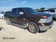 ✅ 2015 Ram 1500 Laramie Longhorn • VIN: 1C6RR6PM5FS735280 • Лот: 74123534. Опубликован ранее на Copart с пробегом Не указан. Бесплатный доступ к архиву аукционных продаж из США и подробный отчёт об истории автомобиля на DreamBid. Изображение 4.