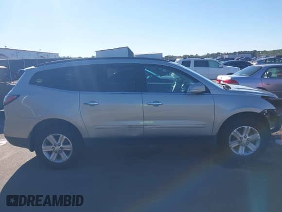 2014 Chevrolet Traverse LT z VIN 1GNKRHKD5EJ134069, wystawiony jako IAAI lot #43489428 z przebiegiem 151 134 mil mil oraz . Historia ofert i sprzedaży dostępna na DreamBid. Obrazek 14.