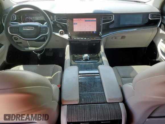 ✅ 2022 Jeep Wagoneer Series III • VIN: 1C4SJUDT6NS118082 • Лот: 67743375. Опубликован ранее на Copart с пробегом 45 306 миль. Бесплатный доступ к архиву аукционных продаж из США и подробный отчёт об истории автомобиля на DreamBid. Изображение 8.