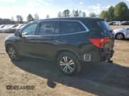 ✅ 2017 Honda Pilot EX-L • VIN: 5FNYF6H71HB093968 • Lot: 84877045. Listed on Copart with 141,980 mi. Free auction sales archive from the USA and detailed vehicle history report at DreamBid. Image 2.