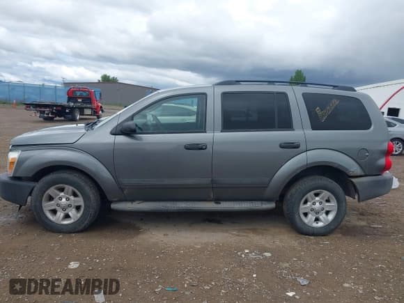 ✅ 2005 Dodge Durango SXT • VIN: 1D4HB38N55F575894 • Лот: 42257542. Опубликован ранее на IAAI с пробегом 260 069 миль. Бесплатный доступ к архиву аукционных продаж из США и подробный отчёт об истории автомобиля на DreamBid. Изображение 14.