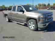 2015 Chevrolet Silverado 1500 LT z VIN 1GCVKREH4FZ272252, wystawiony jako IAAI lot #43392960 z przebiegiem 204 810 mil mil oraz . Historia ofert i sprzedaży dostępna na DreamBid. Obrazek 1.