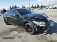 ✅ 2015 Infiniti Q50 Premium • VIN: JN1BV7AP8FM330150 • Lot: 92805435. Listed on Copart with 130,587 mi. Free auction sales archive from the USA and detailed vehicle history report at DreamBid. Image 4.