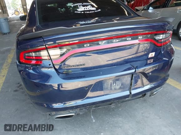✅ 2017 Dodge Charger SE • VIN: 2C3CDXBG9HH537465 • Lot: 43273802. Listed on IAAI with 105,564 mi. Free auction sales archive from the USA and detailed vehicle history report at DreamBid. Image 18.