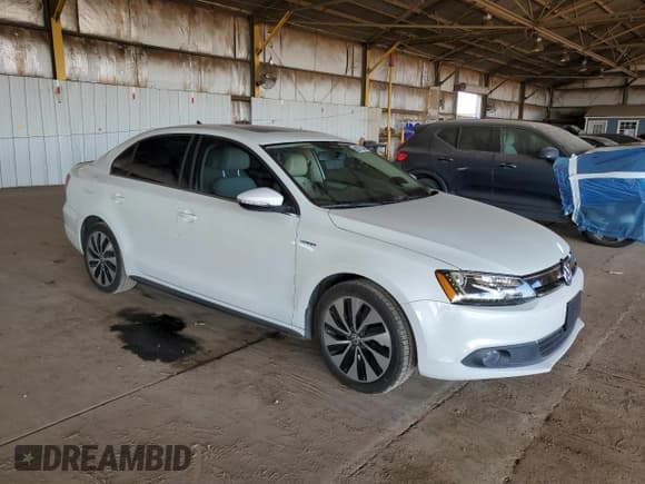 ✅ 2013 Volkswagen Jetta Hybrid • VIN: 3VW637AJ5DM226259 • Lot: 93072045. Listed on Copart with 123,594 mi. Free auction sales archive from the USA and detailed vehicle history report at DreamBid. Image 4.