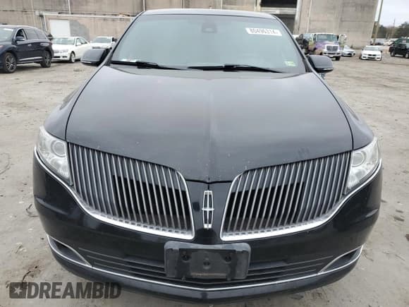 ✅ 2016 Lincoln MKT • VIN: 2LMHJ5NK6GBL00979 • Lot: 80496314. Listed on Copart with 306,943 mi. Free auction sales archive from the USA and detailed vehicle history report at DreamBid. Image 5.