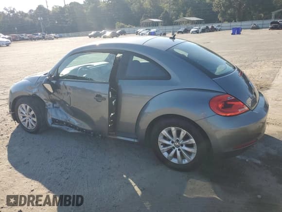 ✅ 2014 Volkswagen Beetle Entry • VIN: 3VWFP7AT7EM623088 • Lot: 83792065. Listed on Copart with 142,189 mi. Free auction sales archive from the USA and detailed vehicle history report at DreamBid. Image 2.