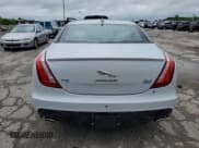 ✅ 2016 Jaguar XJ R-Sport • VIN: SAJWJ1CD1G8W01152 • Lot: 57673925. Listed on Copart with 23,950 mi. Free auction sales archive from the USA and detailed vehicle history report at DreamBid. Image 6.