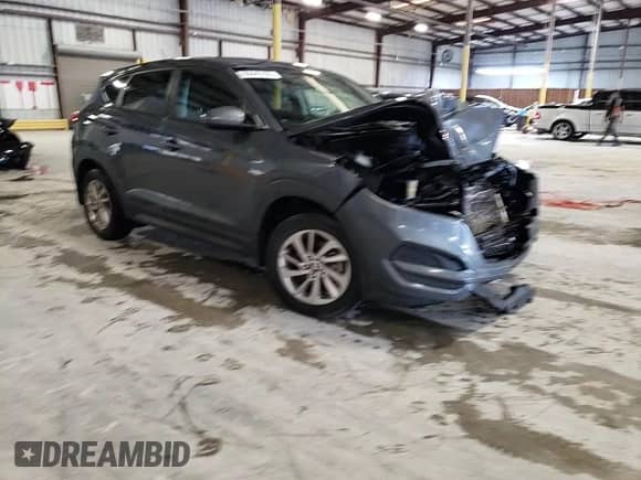 2017 Hyundai Tucson SE z VIN KM8J23A4XHU393961, wystawiony jako Copart lot #85645105 z przebiegiem 86 519 mil mil oraz Szkoda całkowita • Salvage title. Historia ofert i sprzedaży dostępna na DreamBid. Obrazek 14.