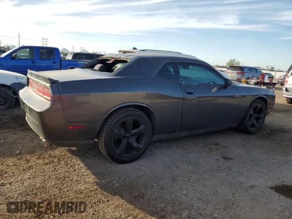 2013 Dodge Challenger SXT с VIN 2C3CDYAG2DH676337, выставлен на аукционе Copart как лот 91129205 с пробегом 173 059 миль миль и Списание • Salvage title. История ставок и продаж доступна на DreamBid. Изображение 3.
