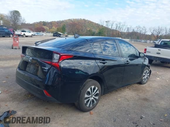 ✅ 2019 Toyota Prius XLE • VIN: JTDL9RFU8K3010245 • Lot: 43601742. Listed on IAAI with 90,815 mi. Free auction sales archive from the USA and detailed vehicle history report at DreamBid. Image 4.