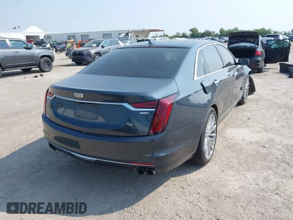 ✅ 2020 Cadillac CT6 Premium Luxury • VIN: 1G6KE5RS5LU107797 • Lot: 43080666. Listed on IAAI with 76,504 mi. Free auction sales archive from the USA and detailed vehicle history report at DreamBid. Image 4.