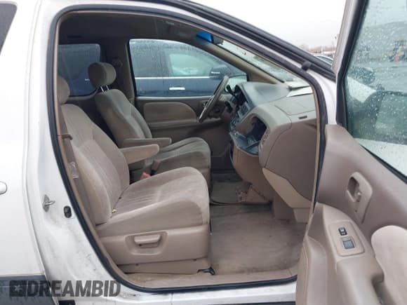 ✅ 1999 Toyota Sienna CE • VIN: 4T3ZF19C0XU169353 • Lot: 41534196. Listed on IAAI with 189,783 mi. Free auction sales archive from the USA and detailed vehicle history report at DreamBid. Image 5.