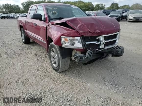 2010 Dodge Dakota Laramie z VIN 1D7CW5GP2AS228332, wystawiony jako Copart lot #71833514 z przebiegiem Nie podano mil oraz Szkoda całkowita • Salvage title. Historia ofert i sprzedaży dostępna na DreamBid. Obrazek 11.