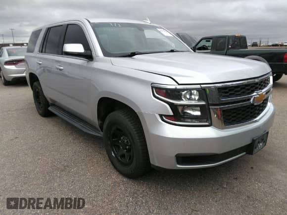 2016 Chevrolet Tahoe Commercial with VIN 1GNSKDEC5GR368328, listed as a IAAI auction lot 41975629 with 104,205 mi miles and . Bid and sale history available at DreamBid. Image 1.