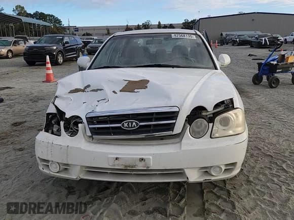 ✅ 2005 Kia Optima LX • VIN: KNAGD128055404032 • Лот: 82568135. Опубликован ранее на Copart с пробегом 147 206 миль. Бесплатный доступ к архиву аукционных продаж из США и подробный отчёт об истории автомобиля на DreamBid. Изображение 13.