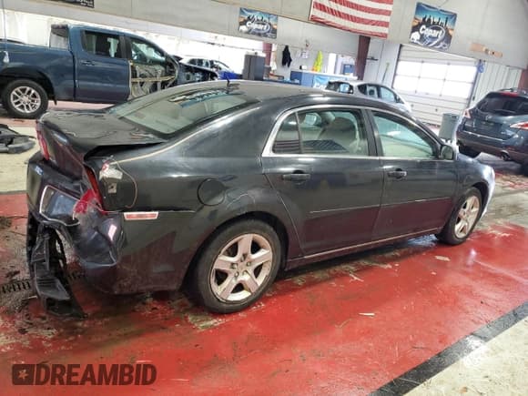 ✅ 2010 Chevrolet Malibu 1LS • VIN: 1G1ZB5EBXAF215031 • Lot: 84895654. Listed on Copart with 115,639 mi. Free auction sales archive from the USA and detailed vehicle history report at DreamBid. Image 3.