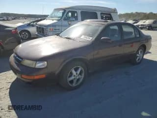 ✅ 1997 Nissan Maxima GXE • VIN: JN1CA21D3VT817964 • Lot: 77006234. Listed on Copart with 242,557 mi. Free auction sales archive from the USA and detailed vehicle history report at DreamBid. Image 1.