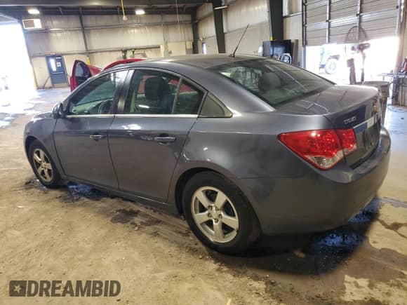 2014 Chevrolet Cruze LT with VIN 1G1PK5SB0E7367556, listed as a Copart auction lot 87376665 with 93,986 mi miles and Salvage title. Bid and sale history available at DreamBid. Image 2.