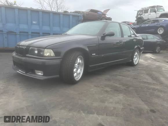 1998 BMW 3 Series M3s with VIN WBSCD9325WEE09458, listed as a Copart auction lot 48253425 with 254,162 mi miles and Clean title. Bid and sale history available at DreamBid. Image 2.
