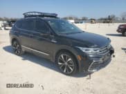 ✅ 2023 Volkswagen Tiguan SEL R-Line • VIN: 3VV4B7AX5PM038607 • Lot: 46244715. Listed on Copart with 26,691 mi. Free auction sales archive from the USA and detailed vehicle history report at DreamBid. Image 4.