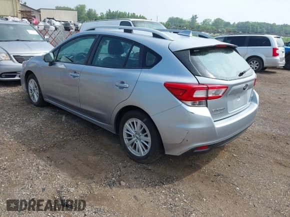 ✅ 2018 Subaru Impreza Premium • VIN: 4S3GTAB62J3708778 • Lot: 42741555. Listed on IAAI with 105,430 mi. Free auction sales archive from the USA and detailed vehicle history report at DreamBid. Image 3.
