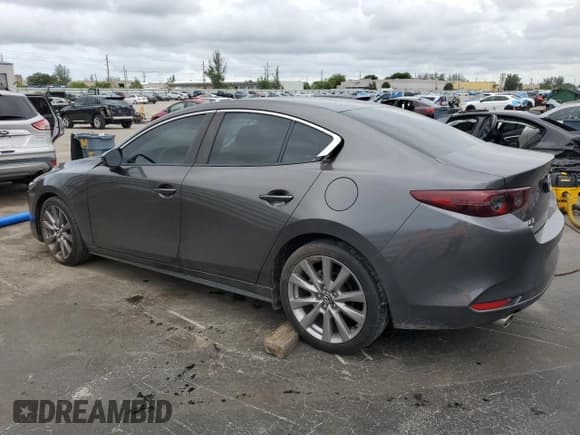 ✅ 2021 Mazda 3 Preferred • VIN: 3MZBPBCL6MM200094 • Lot: 81243655. Listed on Copart with 72,167 mi. Free auction sales archive from the USA and detailed vehicle history report at DreamBid. Image 2.