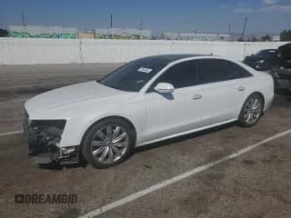 ✅ 2018 Audi A8 • VIN: WAU44AFD5JN000311 • Lot: 72820344. Wystawiony na Copart z przebiegiem 70 140 mil. Bezpłatny archiwum sprzedaży aukcyjnych z USA i szczegółowy raport historii pojazdu na DreamBid. Zdjęcie 1.