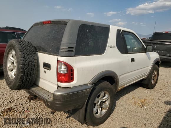 ✅ 2002 Isuzu Rodeo • VIN: 4S2CM57W824306193 • Lot: 71933395. Listed on Copart with 216,462 mi. Free auction sales archive from the USA and detailed vehicle history report at DreamBid. Image 3.