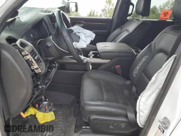 2021 Ram 1500 Rebel z VIN 1C6SRFLT1MN529318, wystawiony jako Copart lot #67312665 z przebiegiem Nie podano mil oraz Szkoda całkowita • Salvage title. Historia ofert i sprzedaży dostępna na DreamBid. Obrazek 7.