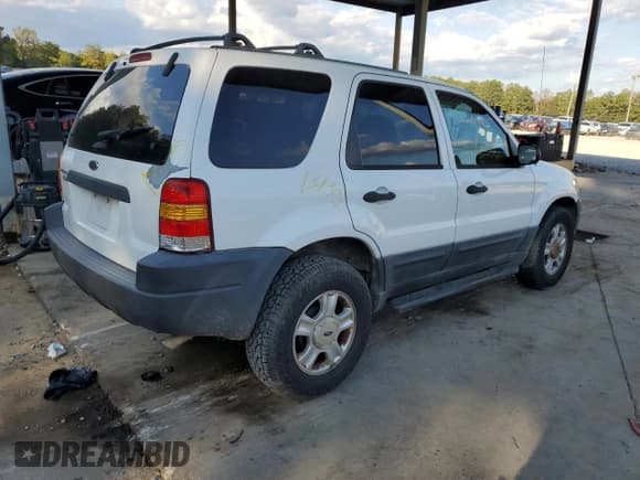 ✅ 2003 Ford Escape XLT Popular • VIN: 1FMYU03113KA61292 • Lot: 81870115. Listed on Copart with 264,945 mi. Free auction sales archive from the USA and detailed vehicle history report at DreamBid. Image 3.