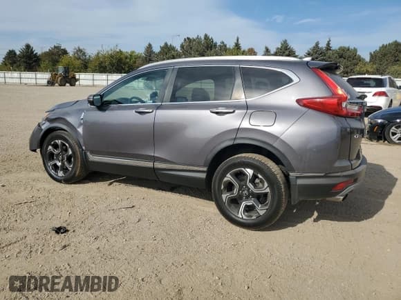 ✅ 2018 Honda CR-V Touring • VIN: 7FARW2H94JE054526 • Лот: 84706965. Опубликован ранее на Copart с пробегом 113 550 миль. Бесплатный доступ к архиву аукционных продаж из США и подробный отчёт об истории автомобиля на DreamBid. Изображение 2.