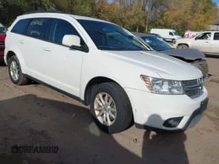✅ 2014 Dodge Journey SXT • VIN: 3C4PDCBG6ET189312 • Lot: 43484038. Listed on IAAI with 199,673 mi. Free auction sales archive from the USA and detailed vehicle history report at DreamBid. Image 1.