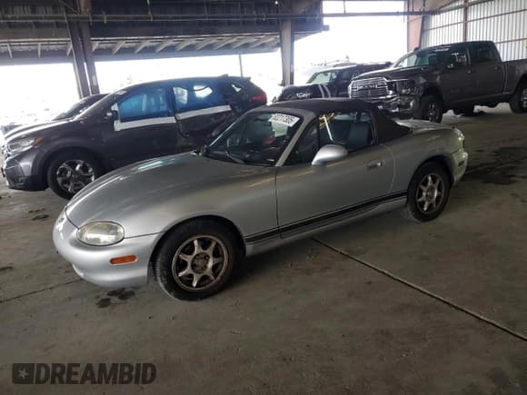 ✅ 1999 Mazda MX-5 Miata • VIN: JM1NB3530X0104289 • Лот: 82217305. Опубликован ранее на Copart с пробегом 150 760 миль. Бесплатный доступ к архиву аукционных продаж из США и подробный отчёт об истории автомобиля на DreamBid. Изображение 1.